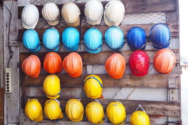 Rack of construction helmets