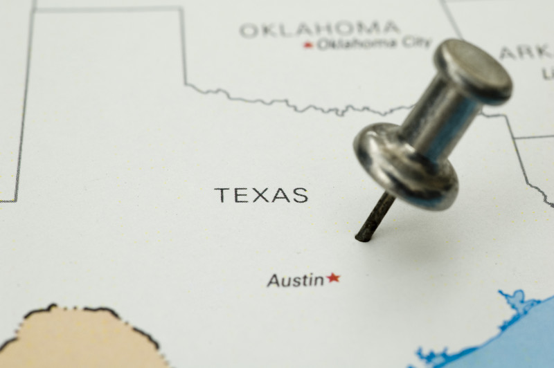 Outline map of Texas with thumbtack above Austin