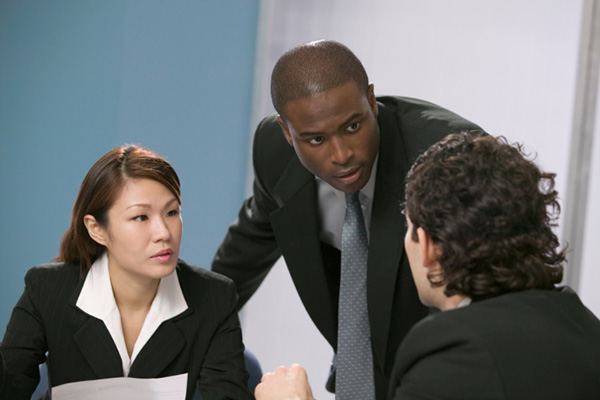 Three businesspeople talking