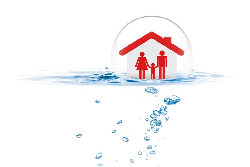 Stick family inside house floating on water inside bubble