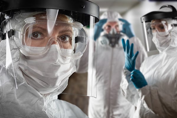 Workers in bio hazmat gear