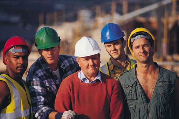 Group of construction workers of different ages