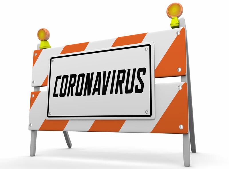 Orange and white construction sign reads coronavirus
