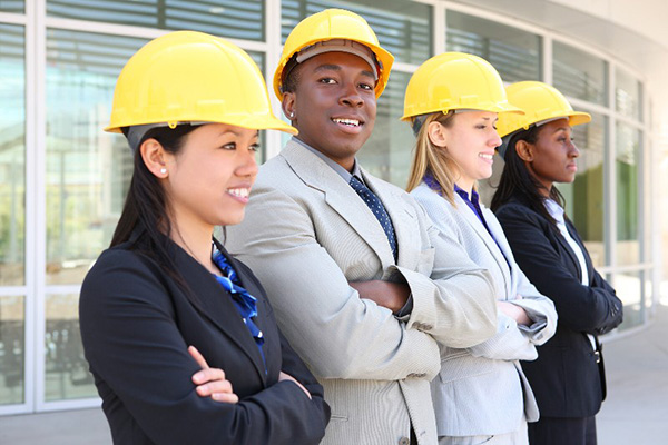 Women in hard hats standing together