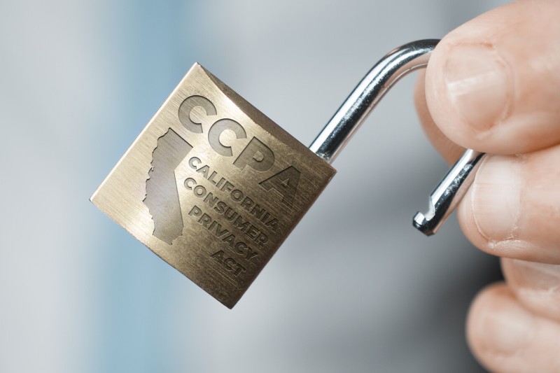 Hand holding a lock with the engraving CCPA California Consumer Privacy Act