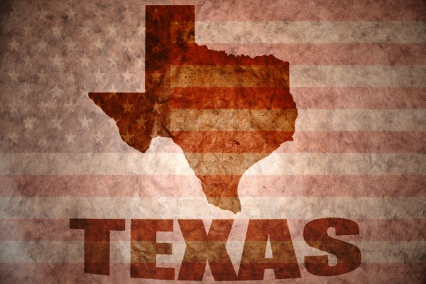 Map of Texas on top of American flag