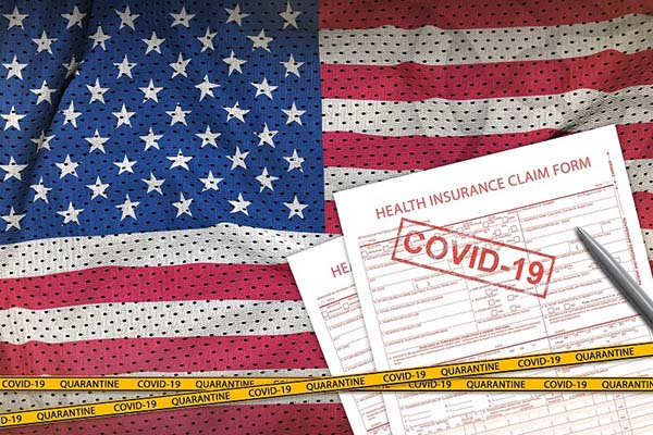US COVID-19 health insurance form on an American flag