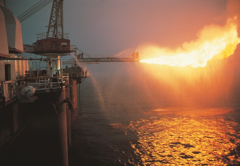 An offshore oil drilling platform burning off excess natural gas