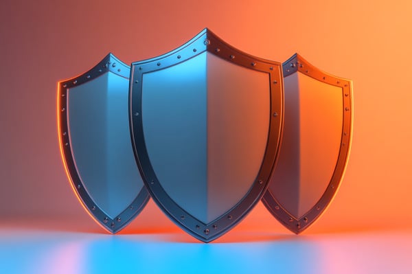 Three steel shields against an orange and blue background