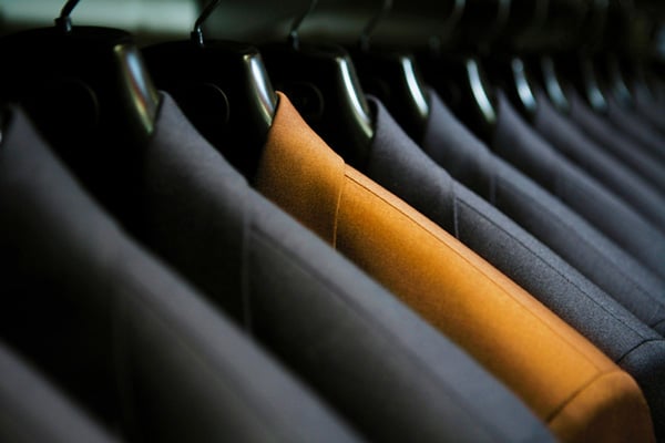 Row of suits--one standing out