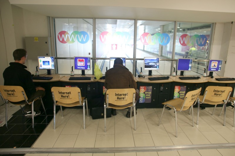 People using computers in an Internet cafe