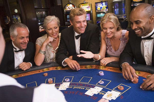 People playing cards at a casino