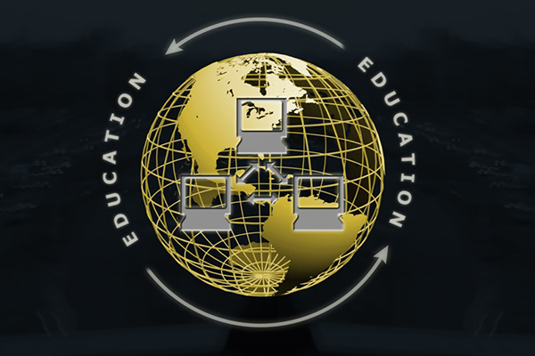 The words education around a gold globe with three connected computers